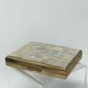 MOP Compact with original comb and many compartments.